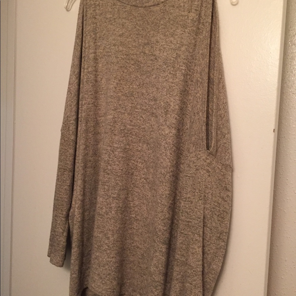 Lose fitting open shoulder top